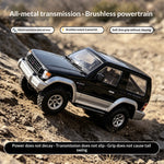 LinkMejor 1297 PRO RTR 1/14 2.4G 4WD Brushless RC Car Official Licensed for Mitsubishi Pajero V24WG 1992 Two Speed Metal Drive Shaft Oil Shocks Full Proportional Off-Road Climbing Truck Vehicles Models Toys
