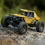 LinkMejor UCX2405 UCX2405 PRO RTR 1/24 2.4G 4WD Brushed/Brushless RC Car Rock Crawler Off-Road Climbing Cage Trail Truck Snow Leopard LED Light Full Proportional Vehicles Models Oil Filled Shocks Toys